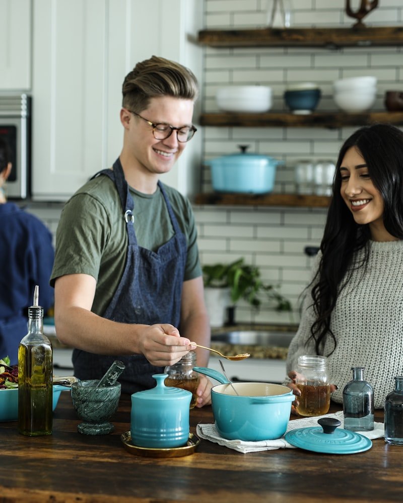 Vancouver homeowners cooking in a recently renovated open-plan kitchen